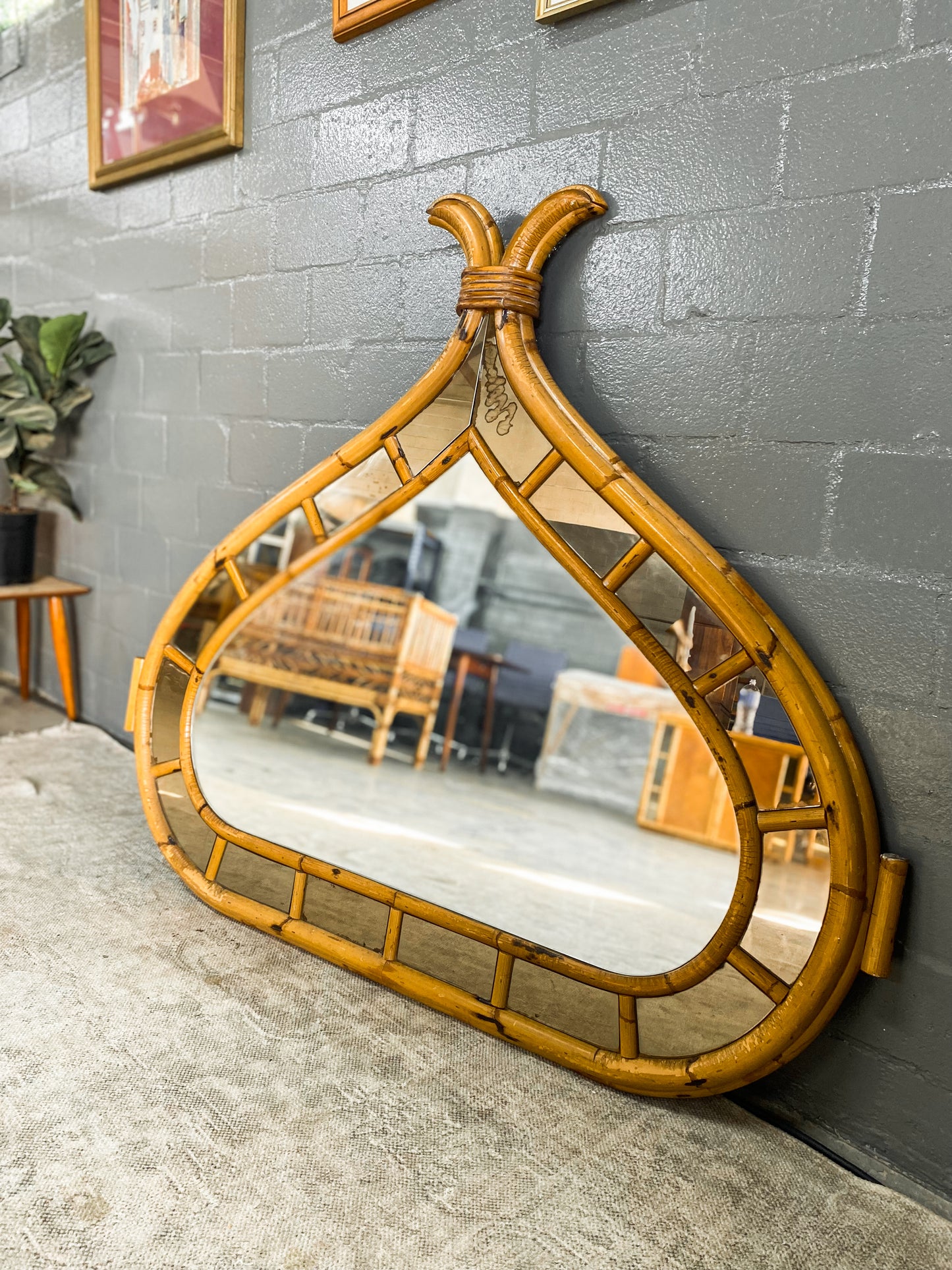 Vintage Cane Mirror with Bali accents.