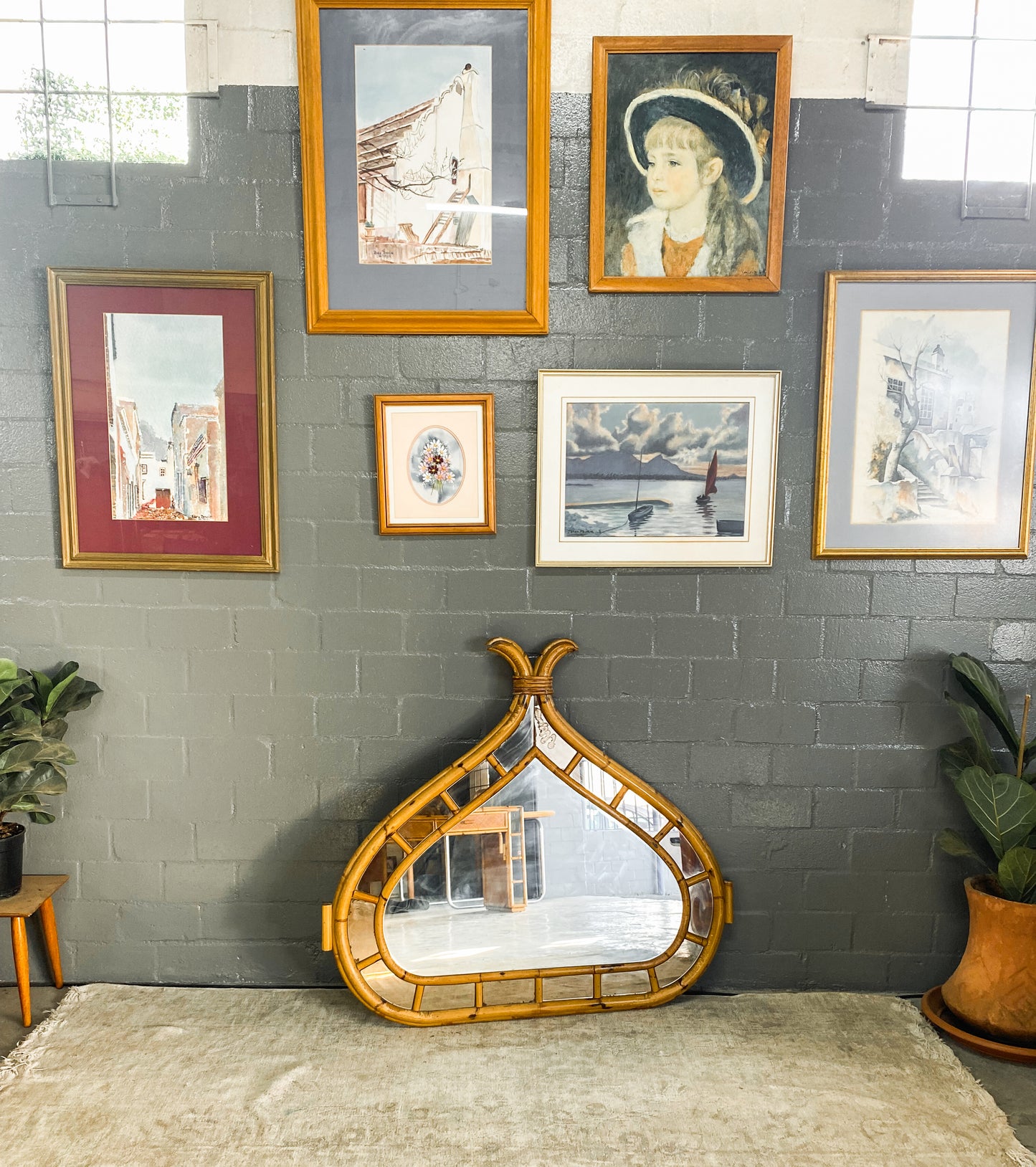 Vintage Cane Mirror with Bali accents.