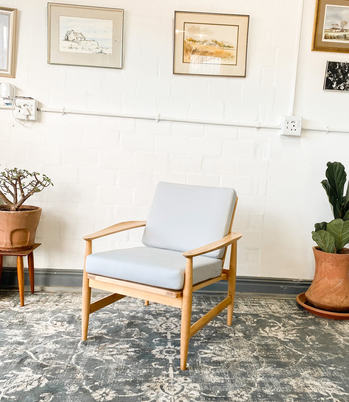 Pair of Swedish Armchairs Featuring Cool Blue Upholstered Cushions.