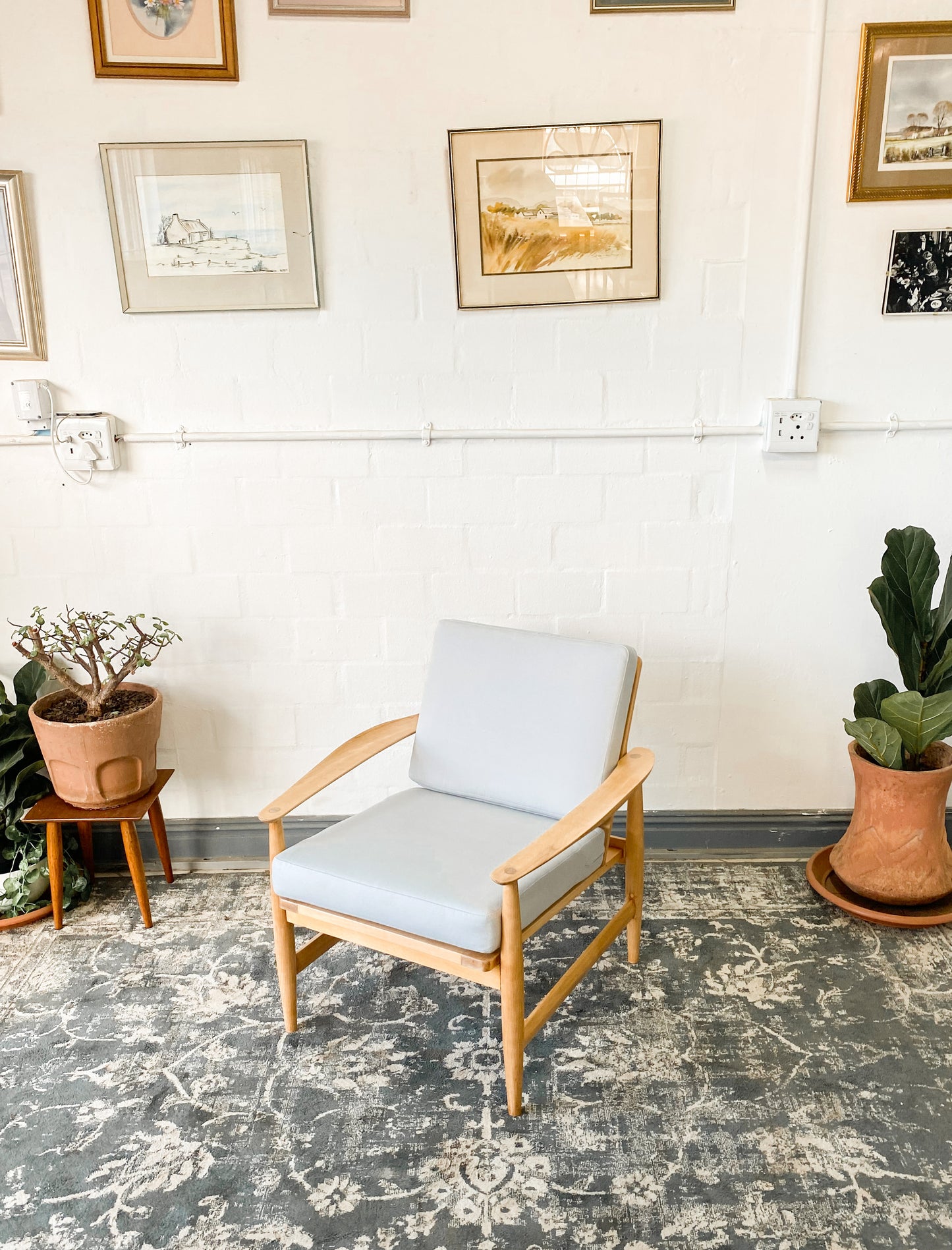 Pair of Swedish Armchairs Featuring Cool Blue Upholstered Cushions.