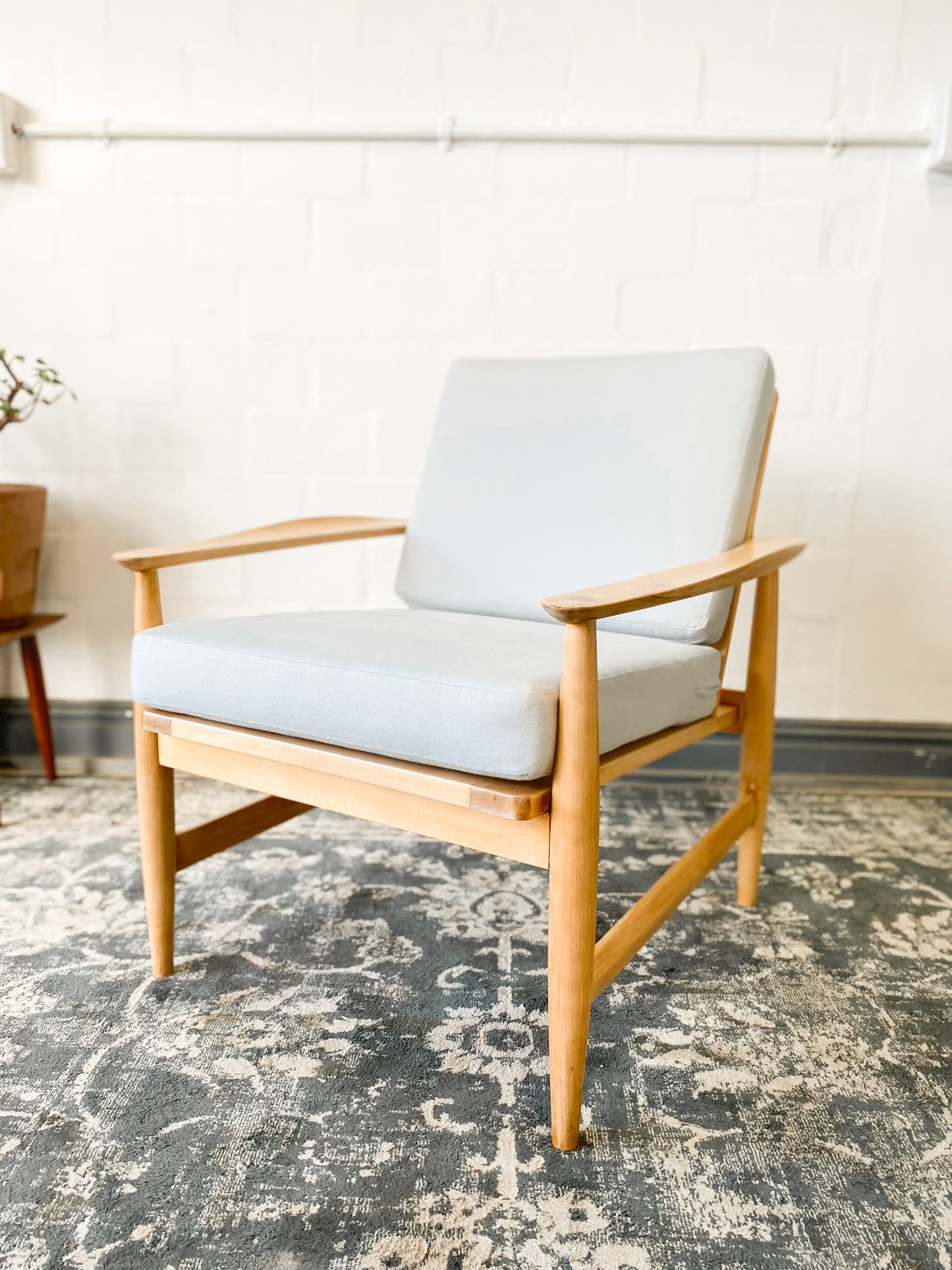 Pair of Swedish Armchairs Featuring Cool Blue Upholstered Cushions.
