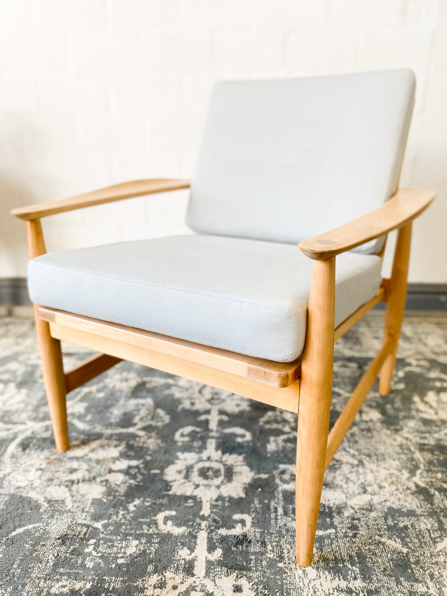 Pair of Swedish Armchairs Featuring Cool Blue Upholstered Cushions.