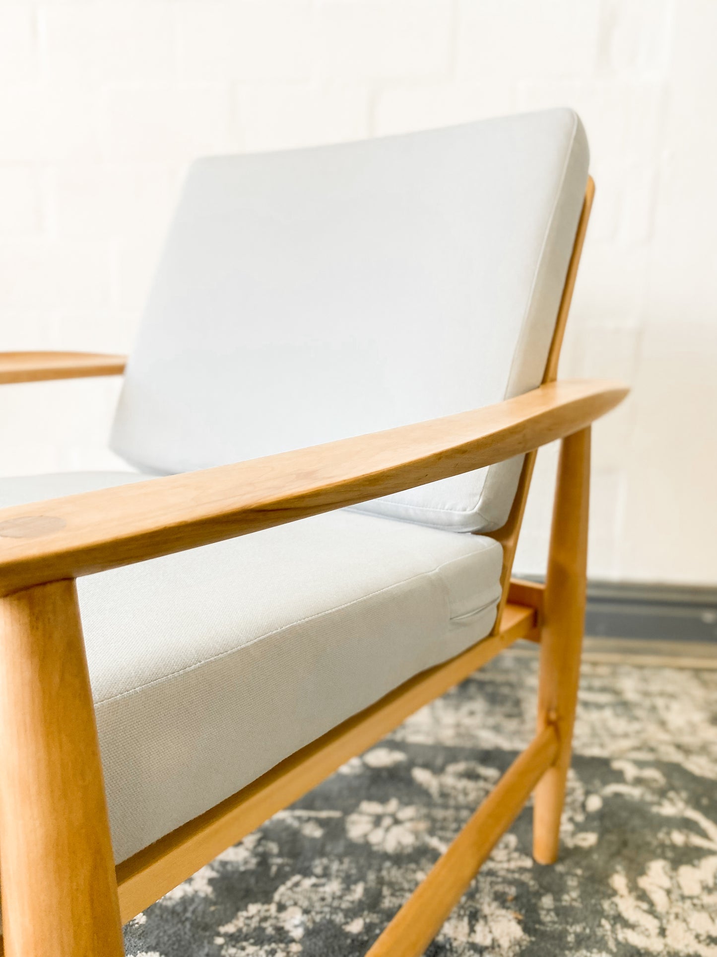 Pair of Swedish Armchairs Featuring Cool Blue Upholstered Cushions.