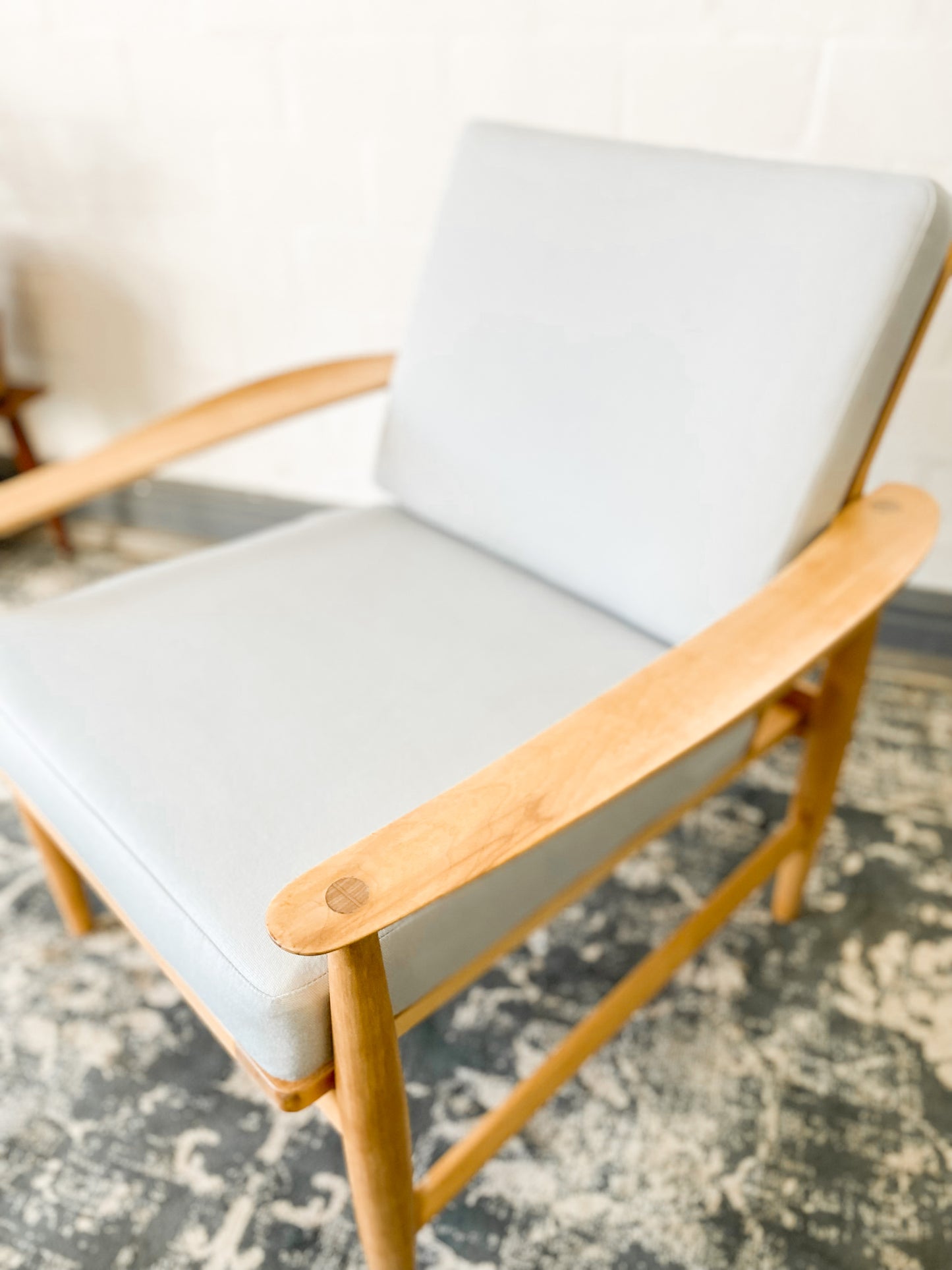 Pair of Swedish Armchairs Featuring Cool Blue Upholstered Cushions.