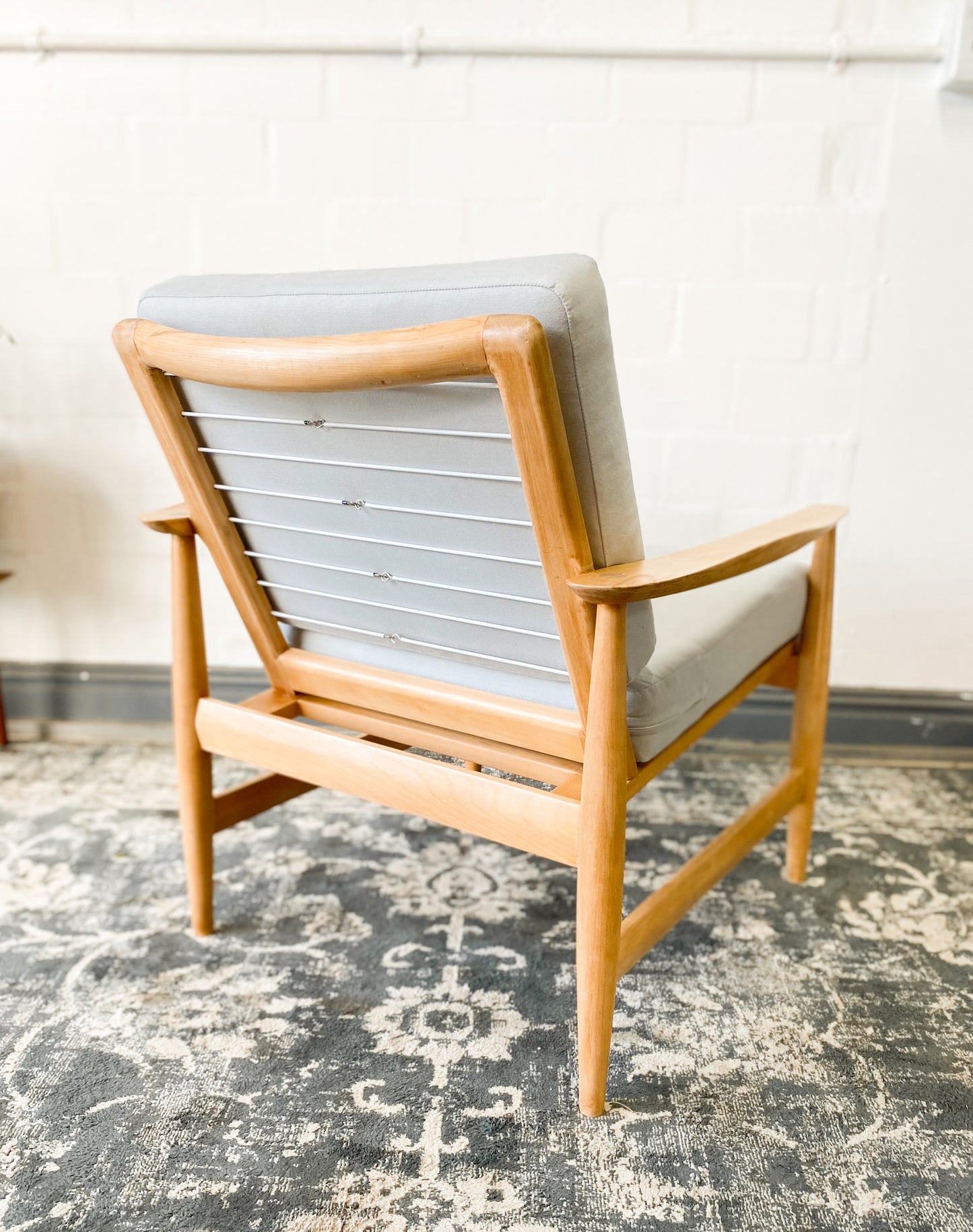 Pair of Swedish Armchairs Featuring Cool Blue Upholstered Cushions.