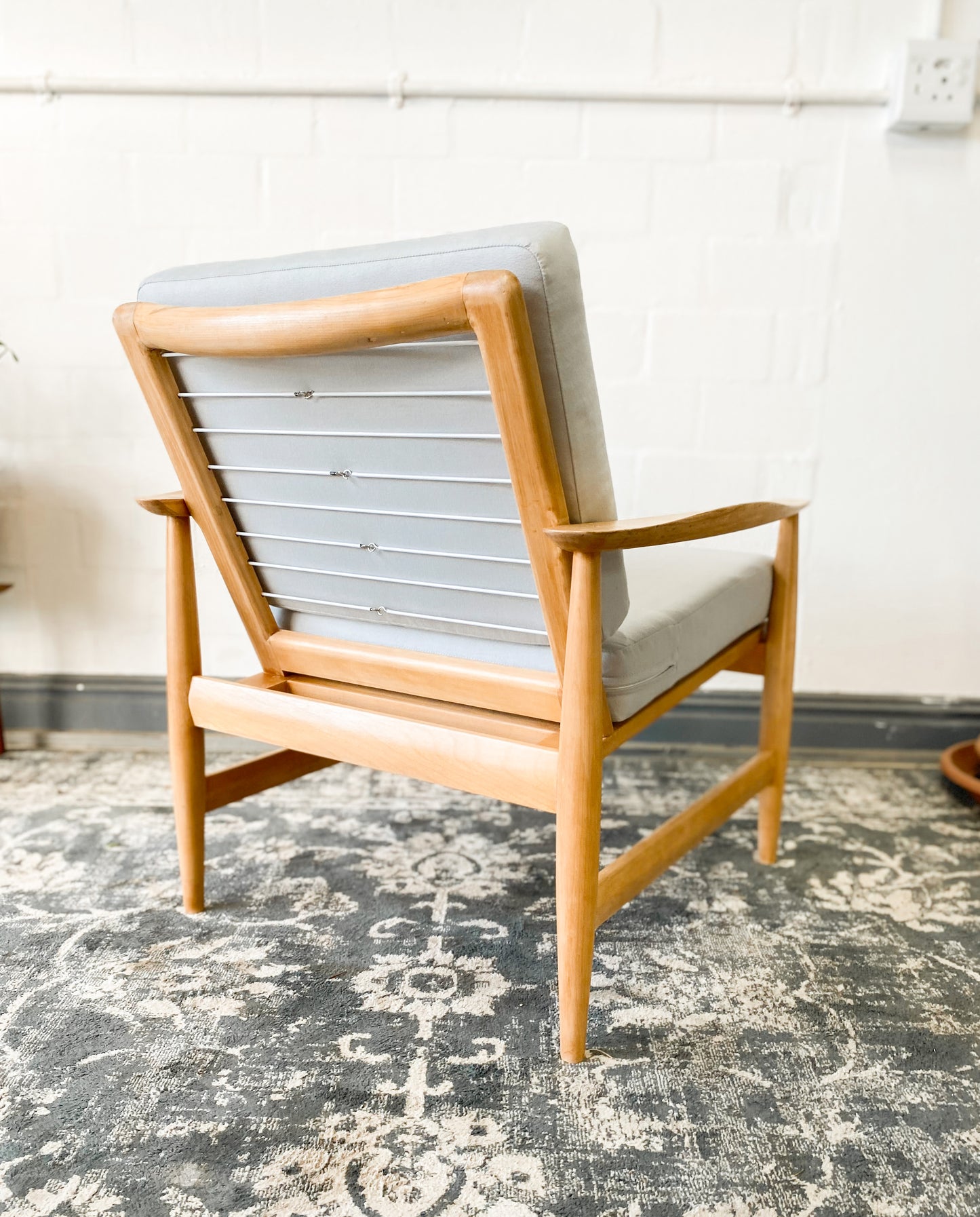 Pair of Swedish Armchairs Featuring Cool Blue Upholstered Cushions.