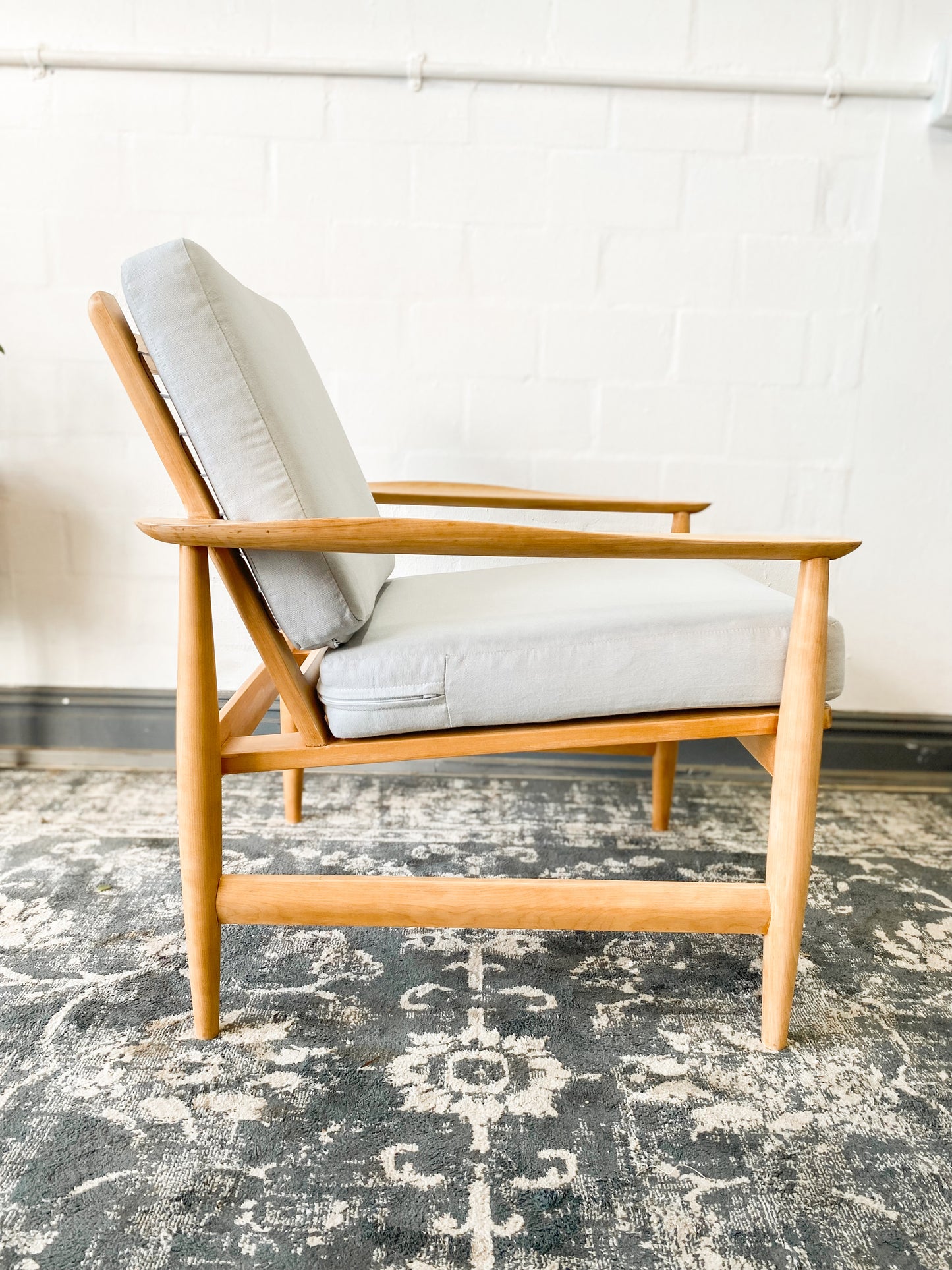 Pair of Swedish Armchairs Featuring Cool Blue Upholstered Cushions.