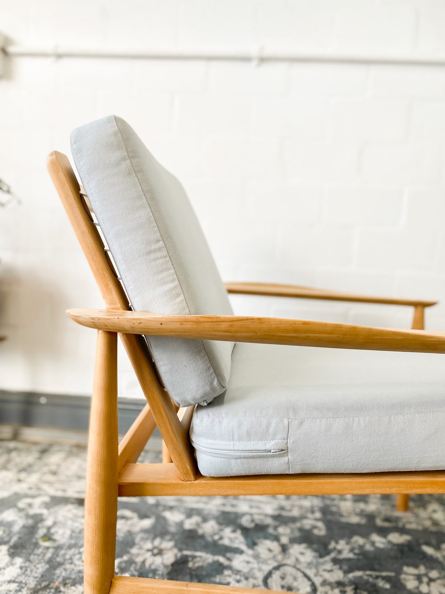 Pair of Swedish Armchairs Featuring Cool Blue Upholstered Cushions.