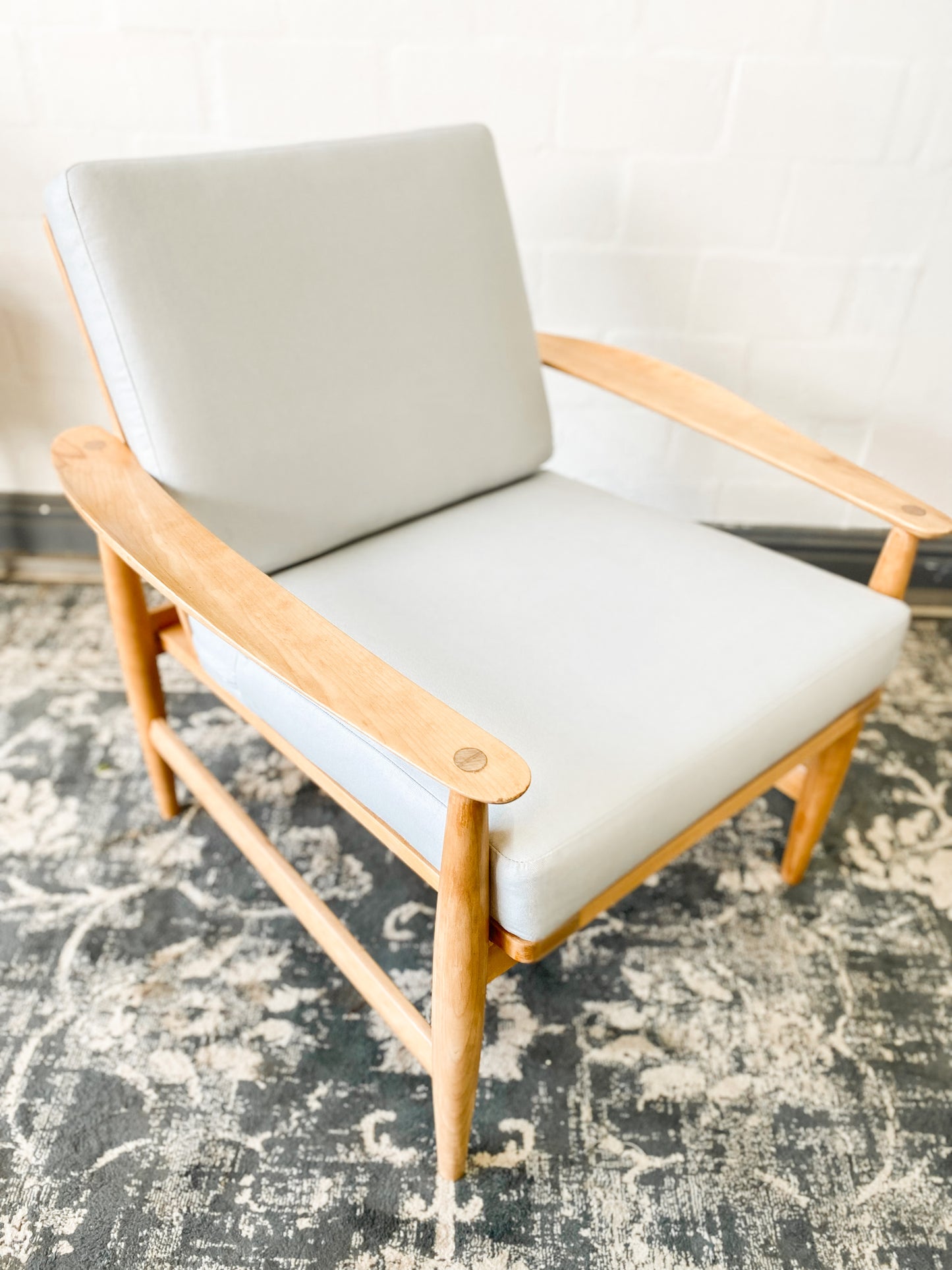 Pair of Swedish Armchairs Featuring Cool Blue Upholstered Cushions.