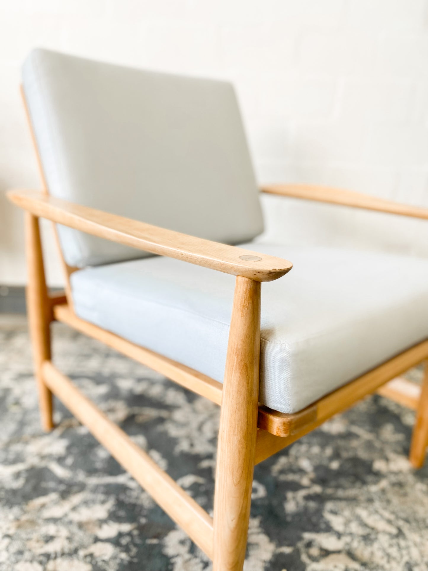 Pair of Swedish Armchairs Featuring Cool Blue Upholstered Cushions.