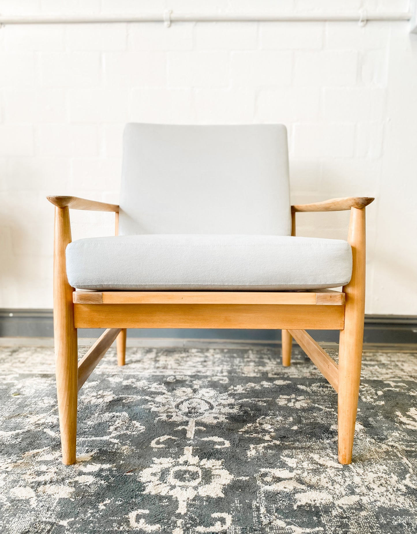 Pair of Swedish Armchairs Featuring Cool Blue Upholstered Cushions.
