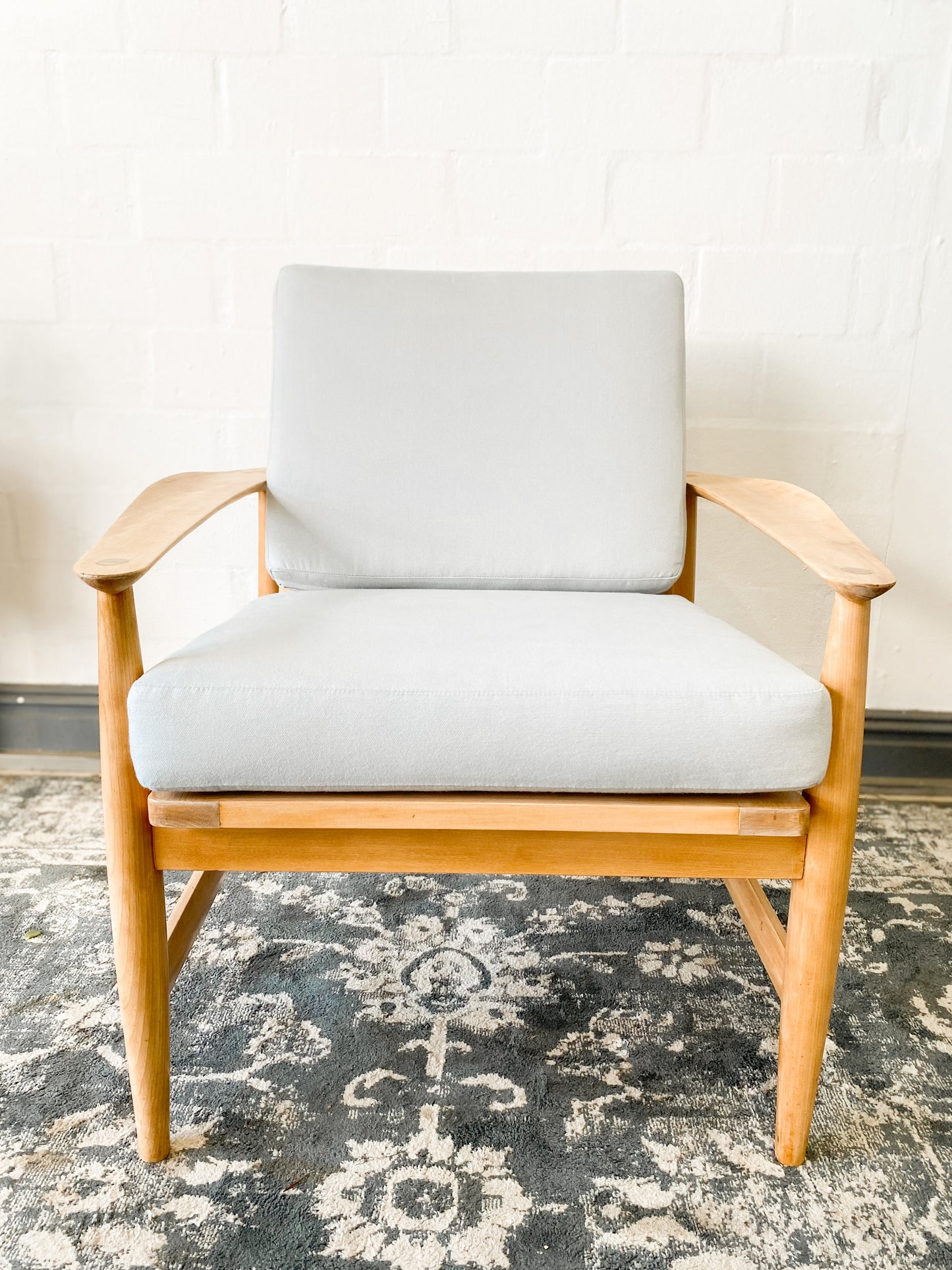 Pair of Swedish Armchairs Featuring Cool Blue Upholstered Cushions.