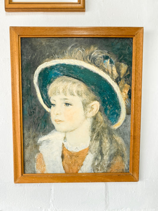 Piere-Auguste Renoir print "Portrait of a Young Girl in a Blue Hat" in wooden frame.