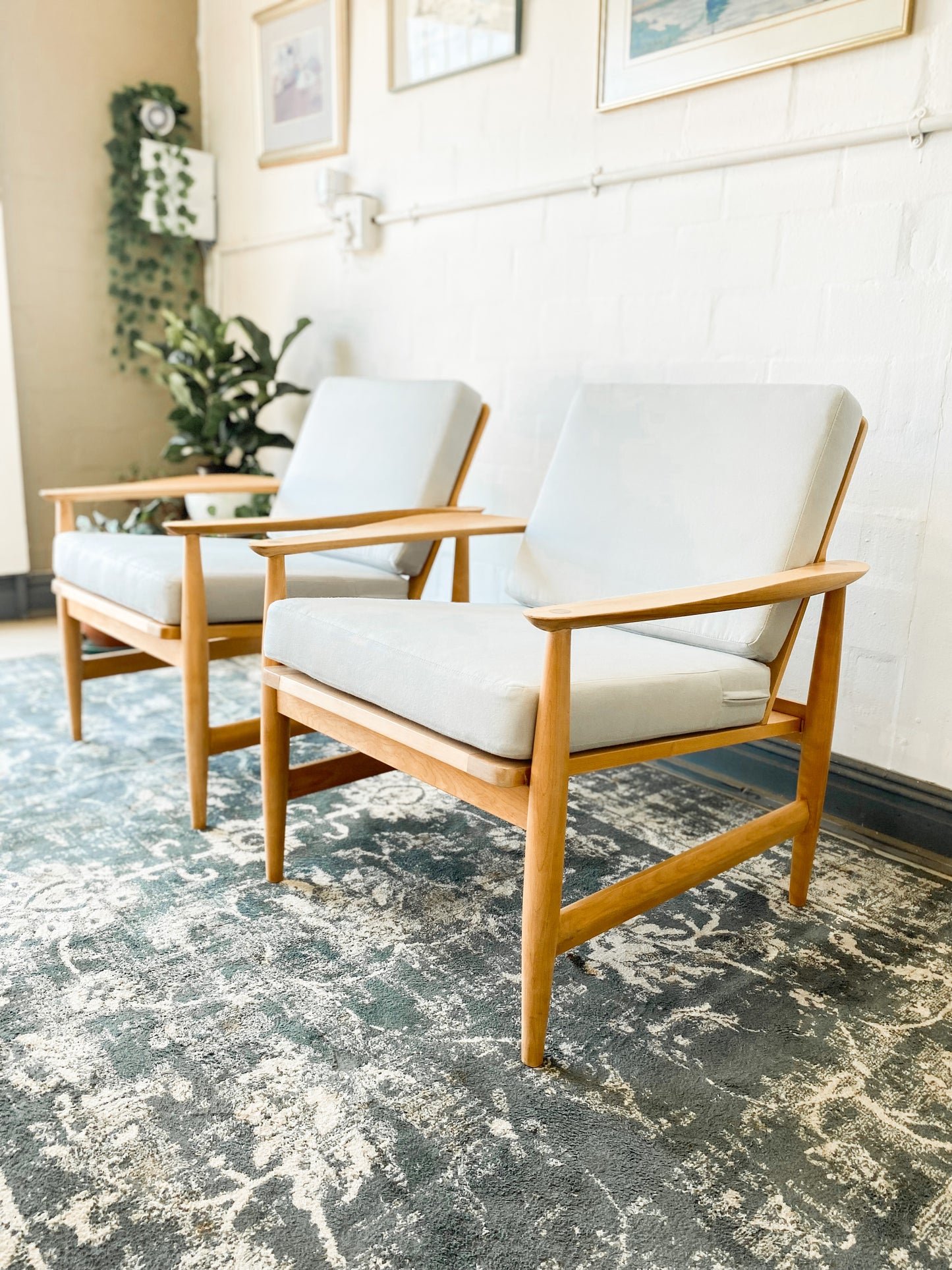 Pair of Swedish Armchairs Featuring Cool Blue Upholstered Cushions.