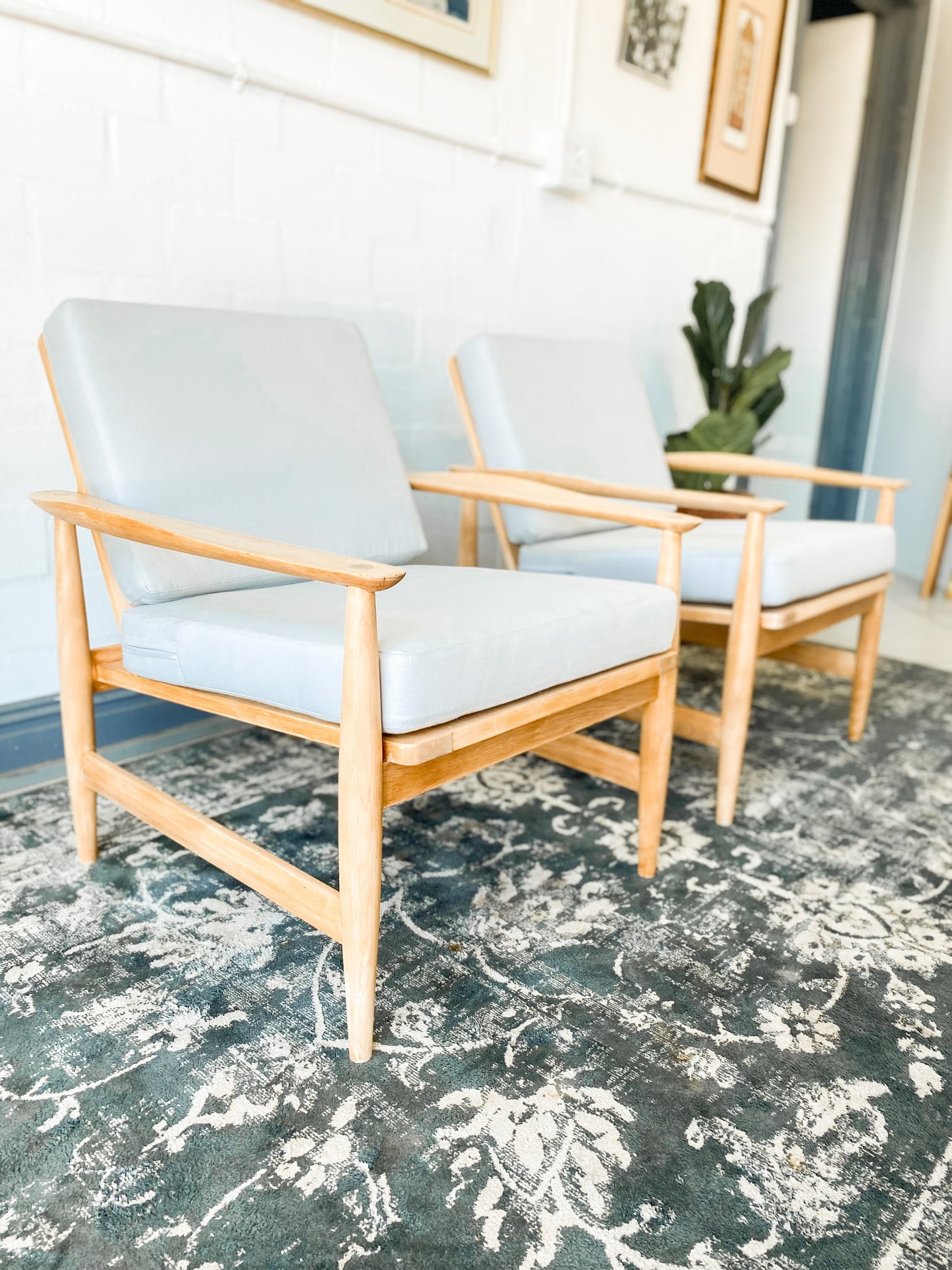 Pair of Swedish Armchairs Featuring Cool Blue Upholstered Cushions.