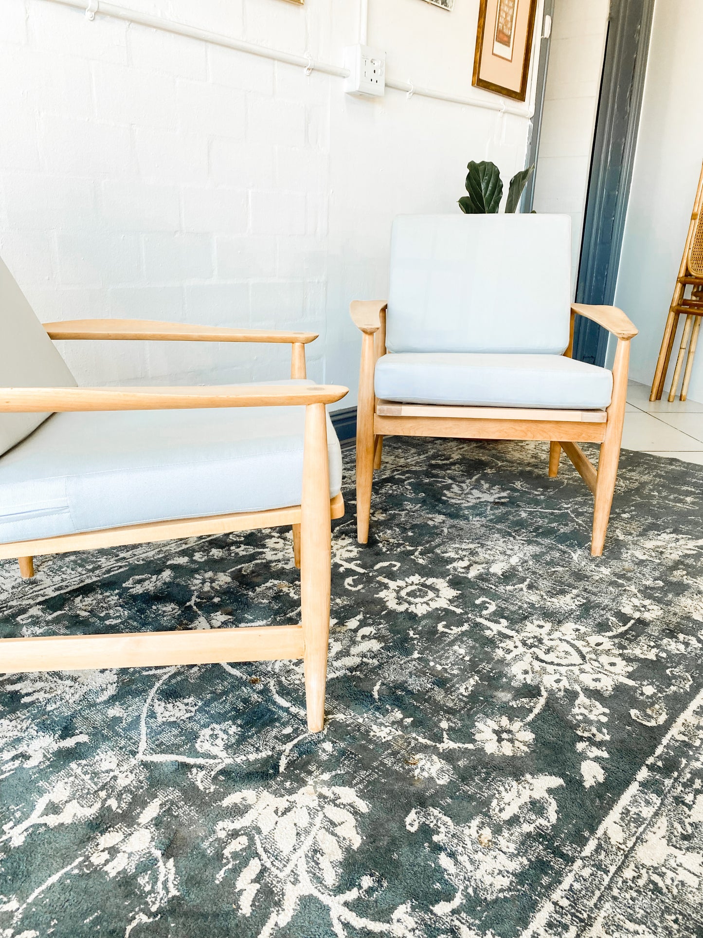 Pair of Swedish Armchairs Featuring Cool Blue Upholstered Cushions.