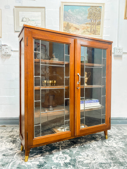 Vintage Cabinet Featuring Leaded Glass Doors