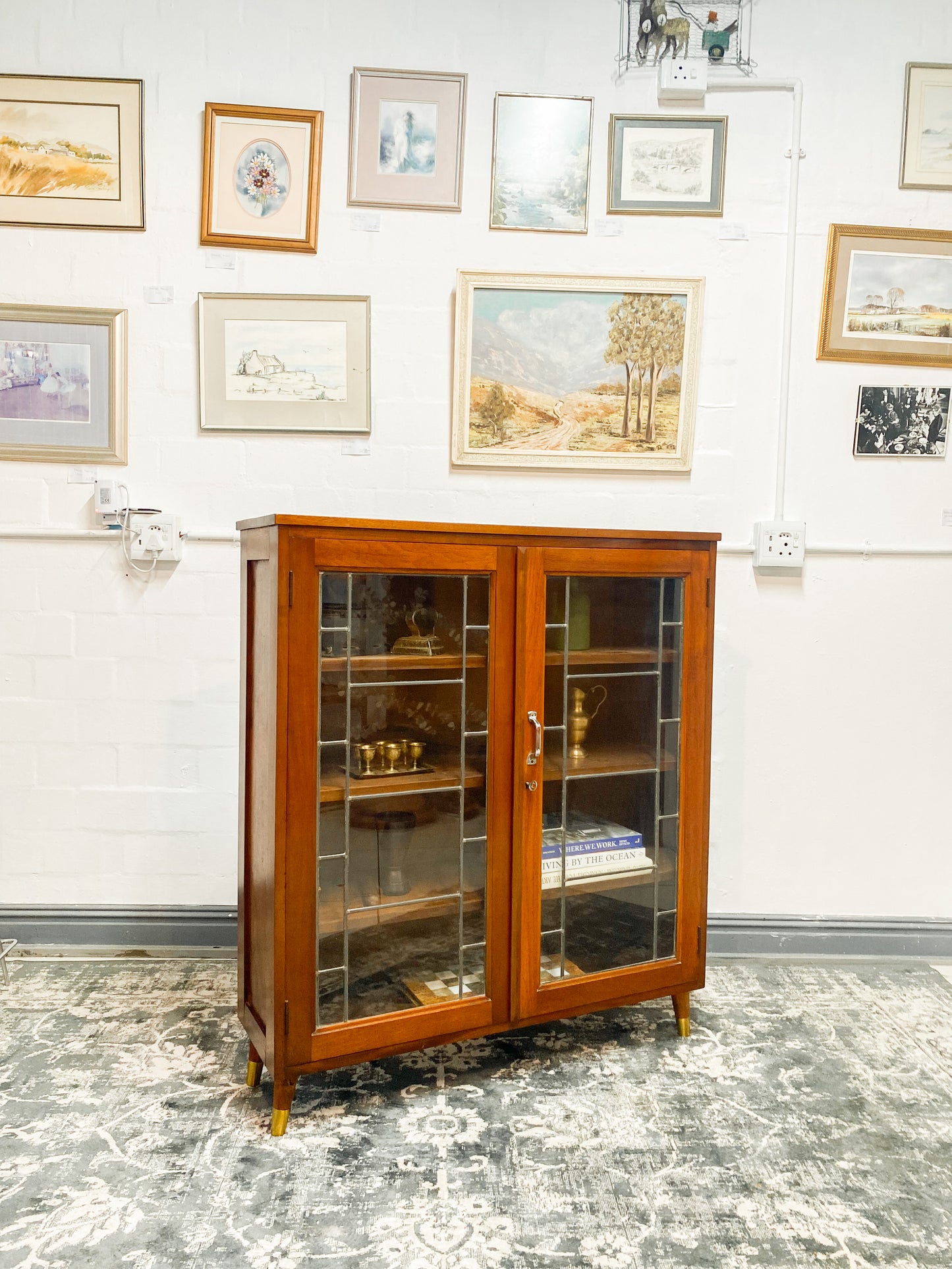 Vintage Cabinet Featuring Leaded Glass Doors