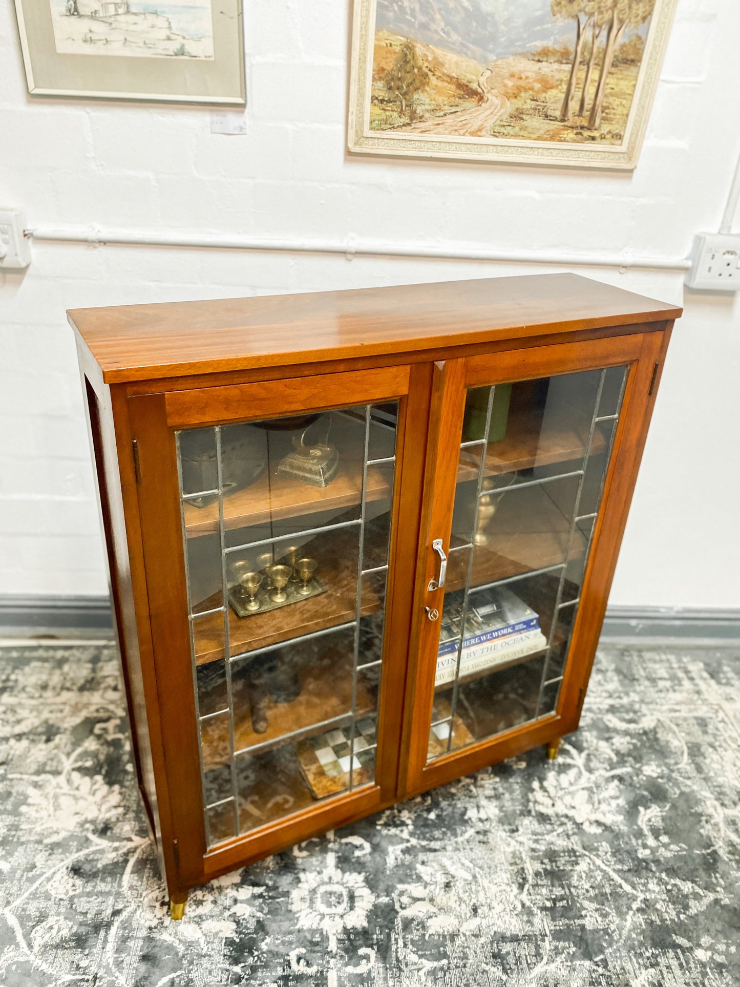 Vintage Cabinet Featuring Leaded Glass Doors