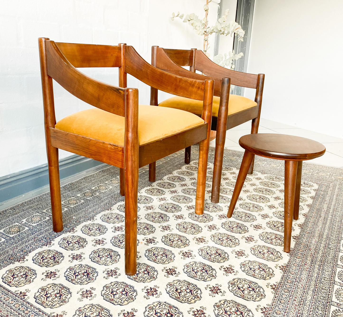 Set of two solid wood Mid-Century Modern Arm Chairs and side table.