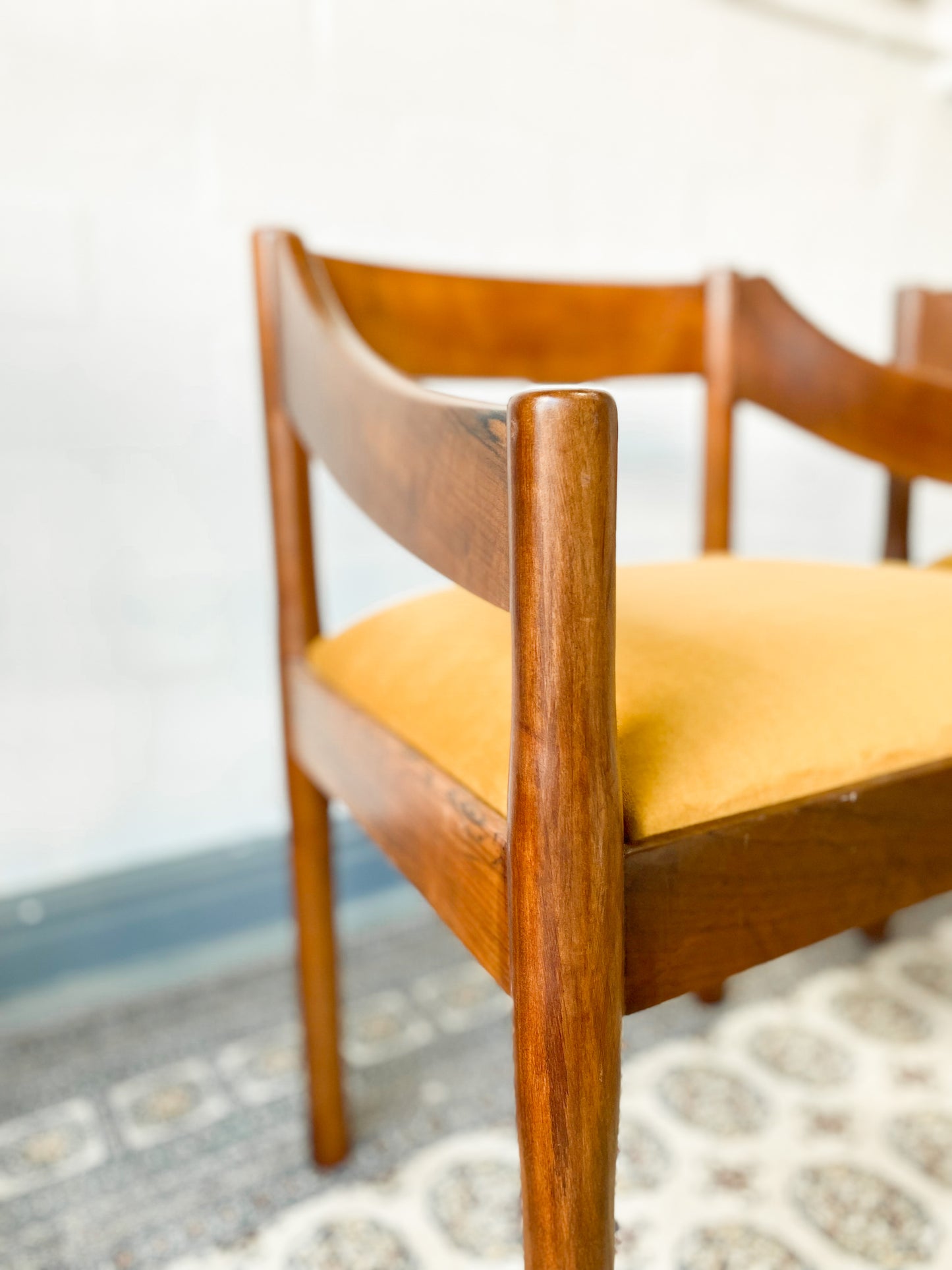 Set of two solid wood Mid-Century Modern Arm Chairs and side table.