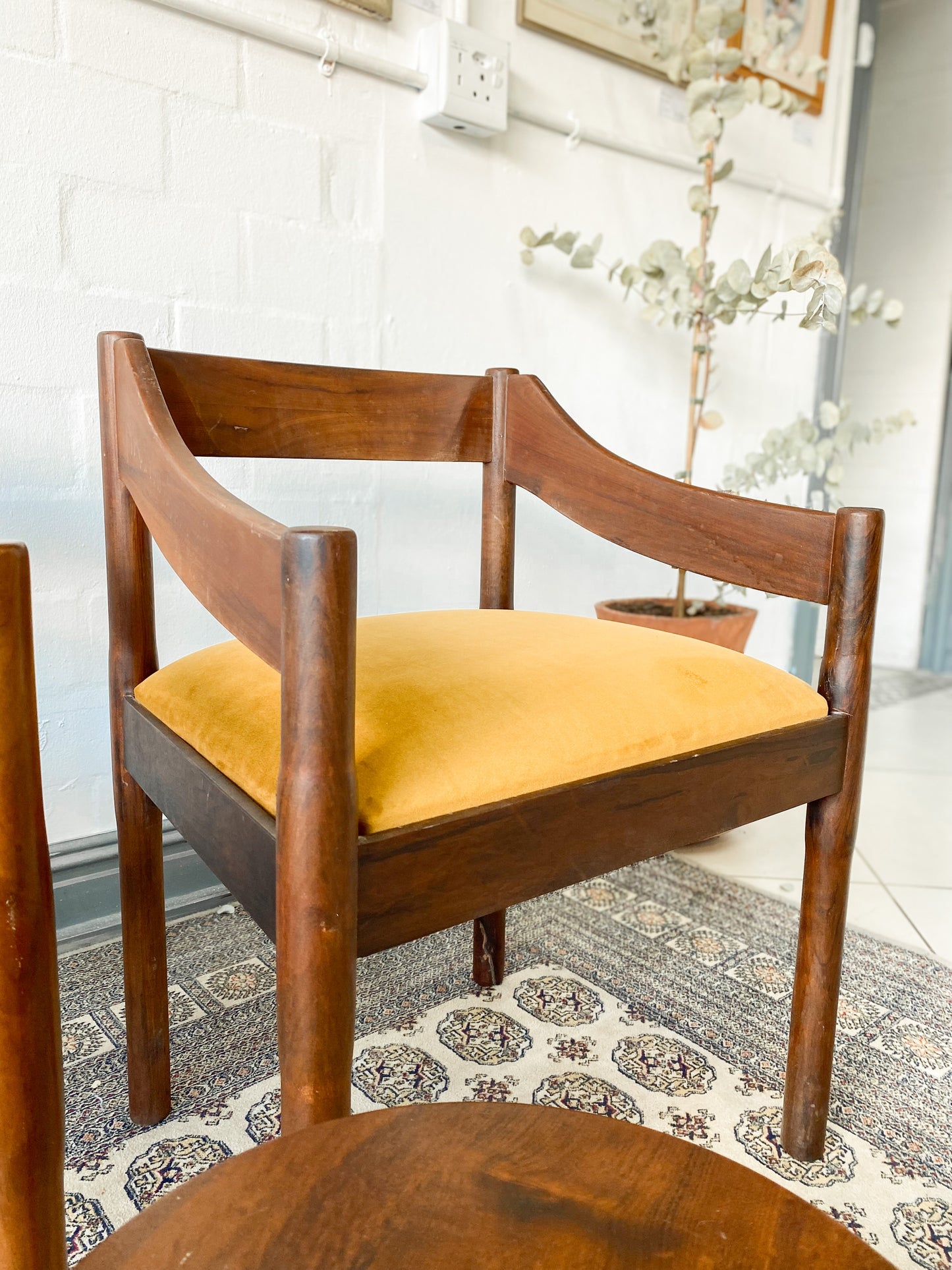 Set of two solid wood Mid-Century Modern Arm Chairs and side table.