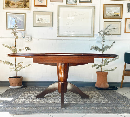Elegant Extendable Imbuia 6-8 seat dining table made by premium South African designer EE Meyer.