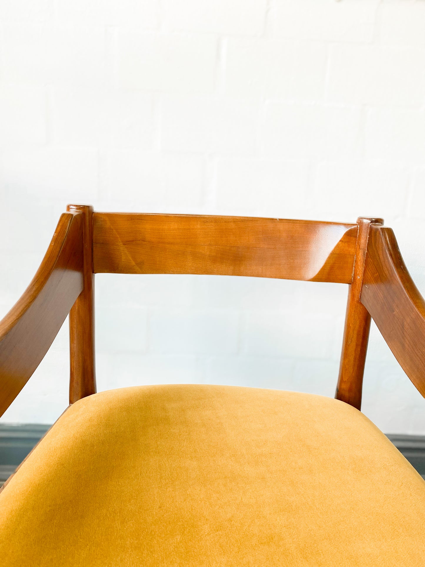Set of two solid wood Mid-Century Modern Arm Chairs and side table.
