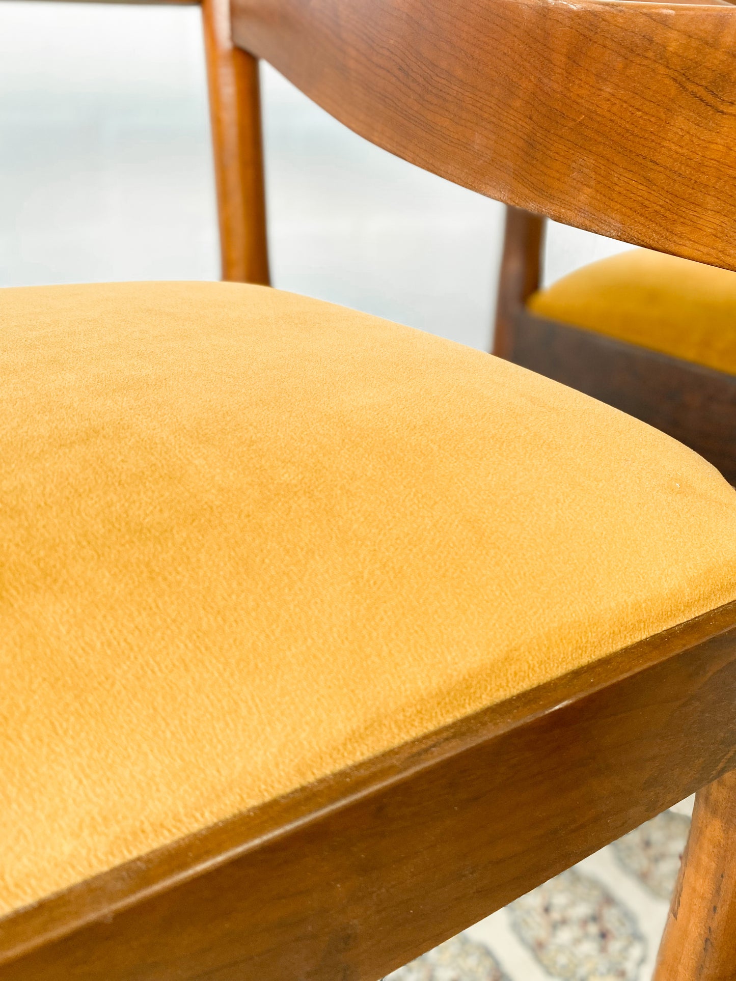 Set of two solid wood Mid-Century Modern Arm Chairs and side table.